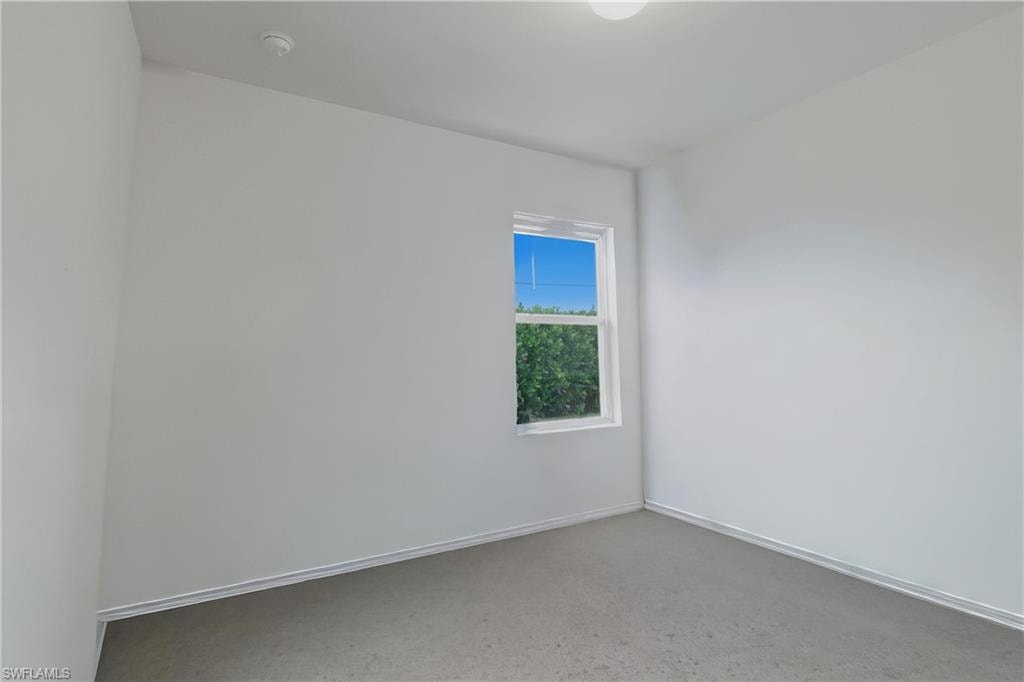 Spare room with baseboards