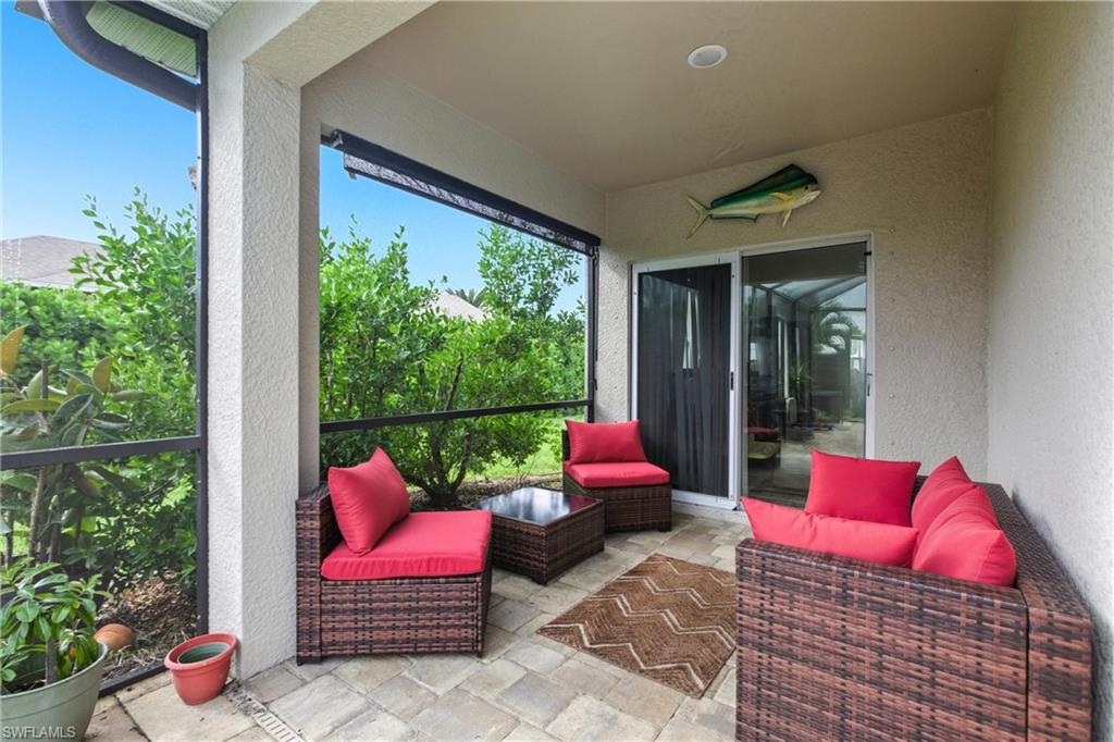 Sunroom with an outdoor hangout area and a patio