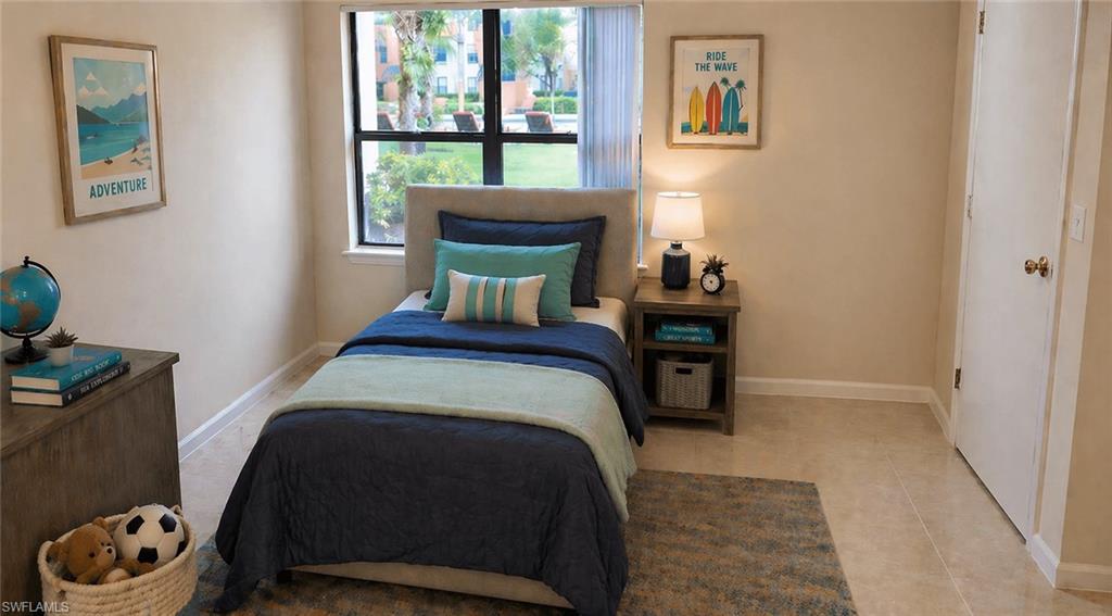 Bedroom featuring light-toned walls and tile flooring