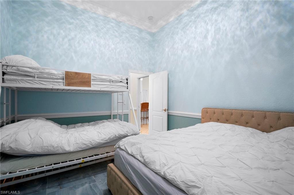 Bedroom with ornamental molding