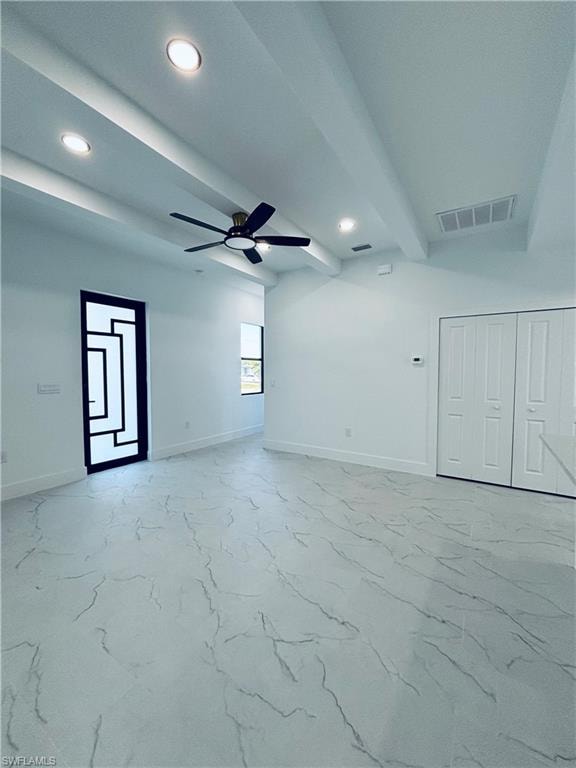 Empty room with beamed ceiling, recessed lighting, ceiling fan, and light marble finish floors
