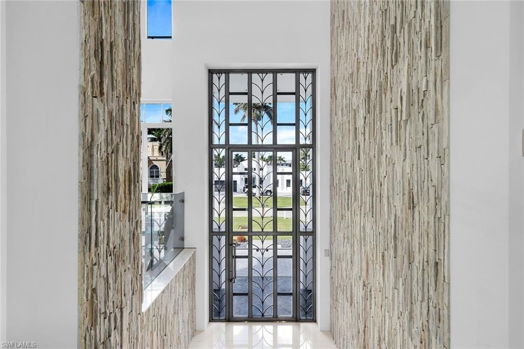 Tiffany stainless-steel front door showcasing modern elegance and craftsmanship.