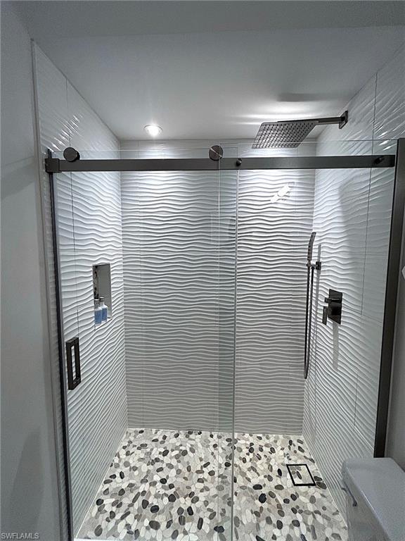 Bathroom with a shower stall