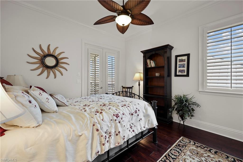 Third floor Guest bedroom, French doors to balcony overlooking water