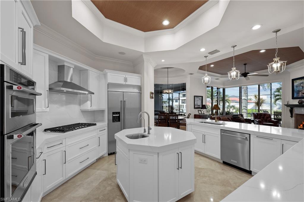 Like new updated kitchen, gas cooktop, KitchenAid Stainless appliances, Pompeii Quartz countertops and custom cabinets