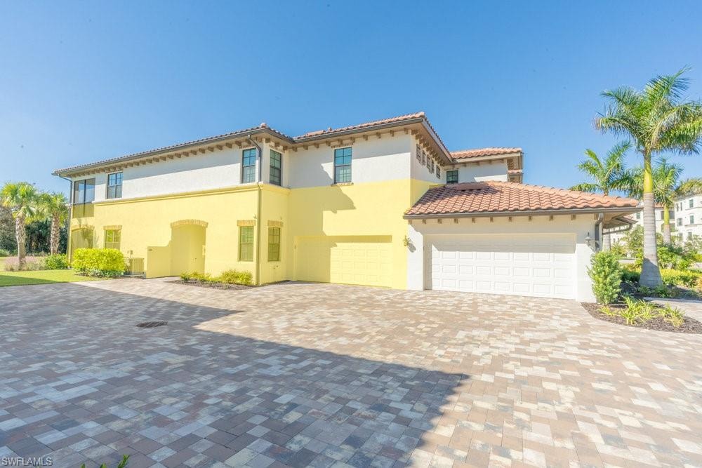 1st floor coach home 2 car attached garage