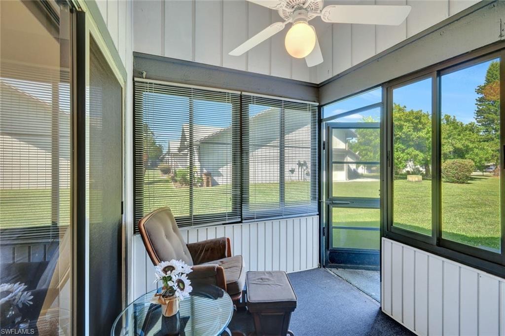 Screened sunroom with ceiling fan