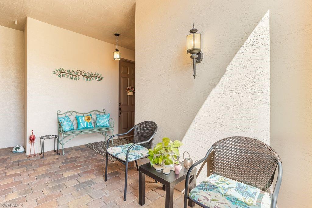 View of covered patio / terrace area leading up to the front entry