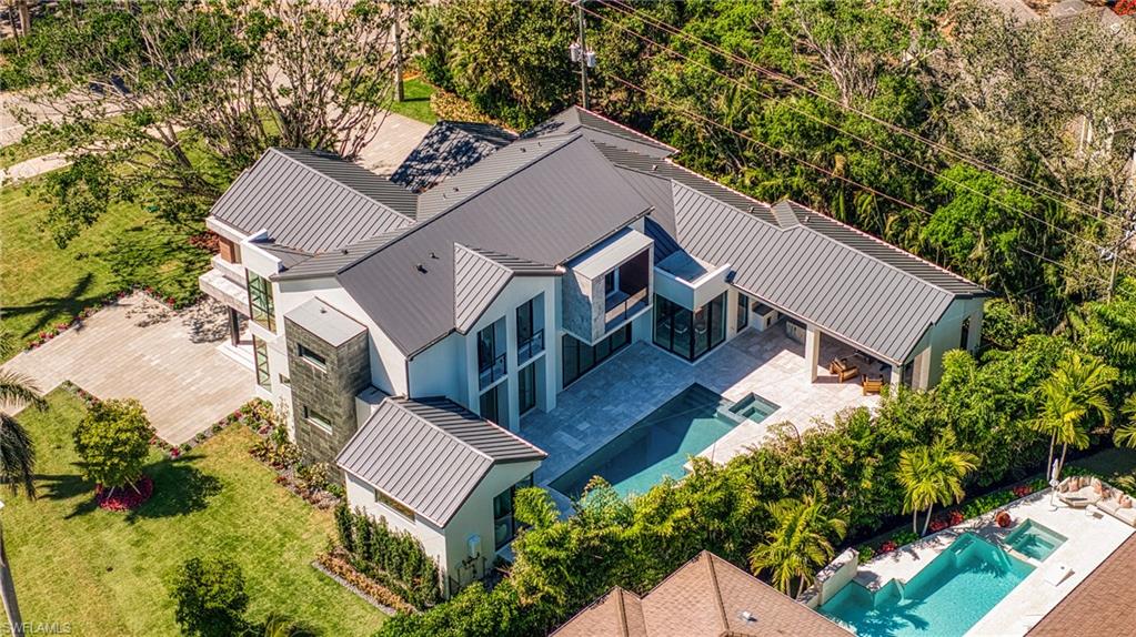 View from above of property featuring a pool area