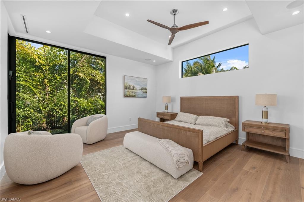 Master Bedroom featuring recessed lighting, a ceiling fan, and light wood finished floors