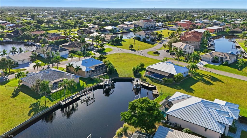 Aerial view of residential area with a large body of water