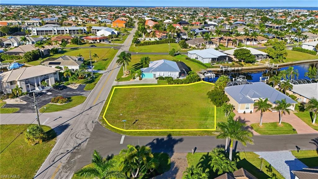 Aerial view of residential area with a large body of water