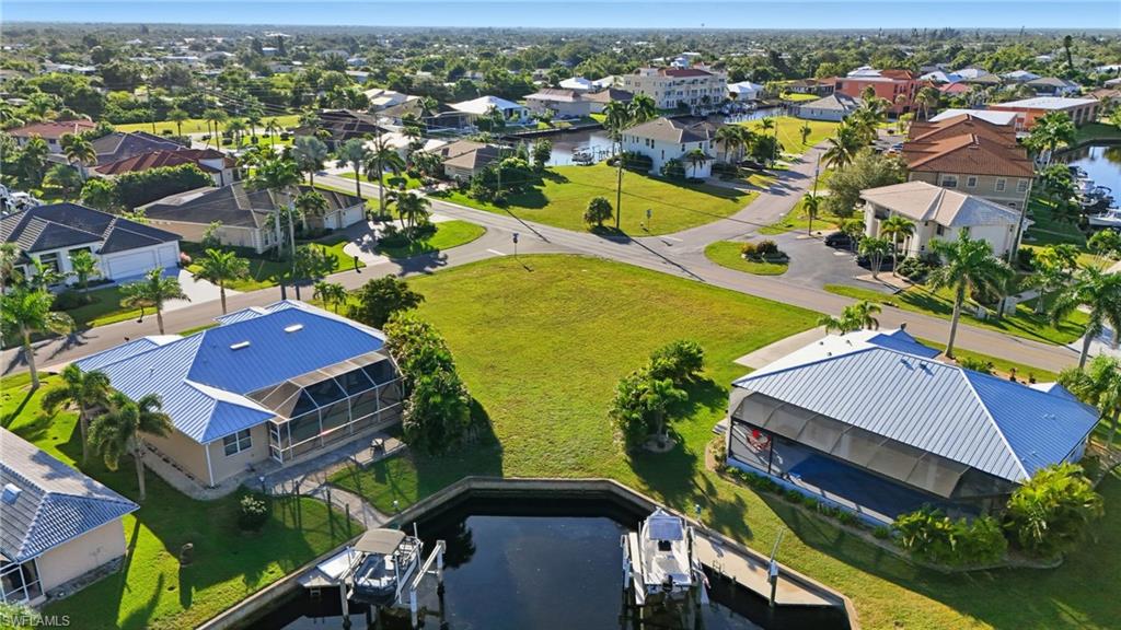Aerial view of residential area with a large body of water