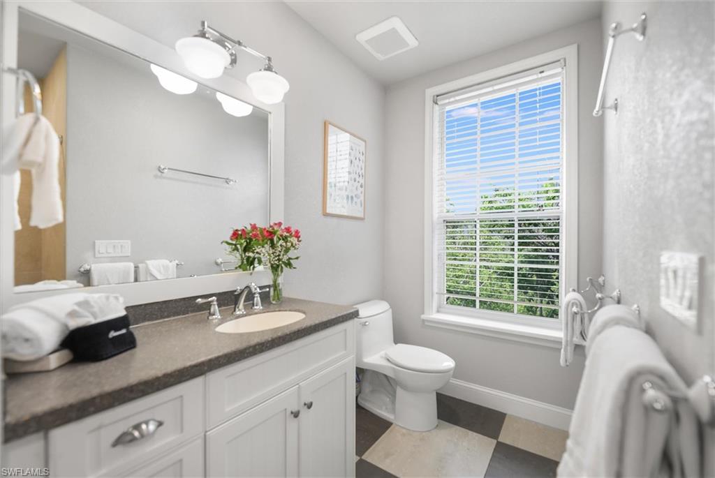 Bathroom featuring toilet and vanity