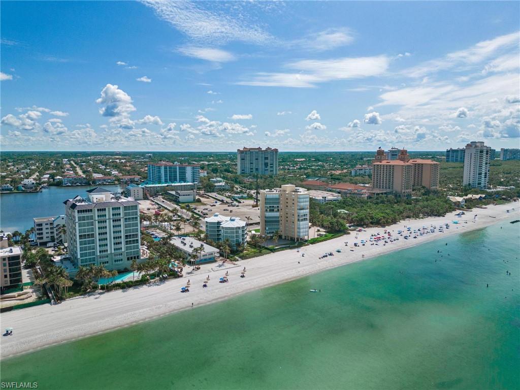 View of urban area with waterfront with a beach