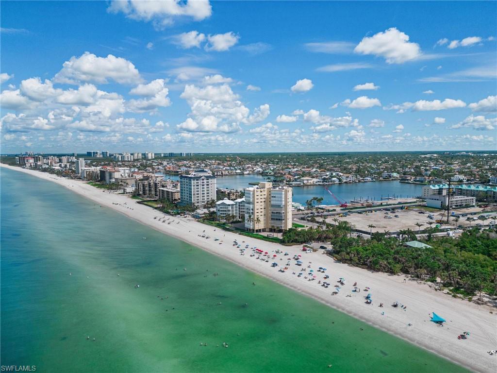 View of urban area with waterfront with a beach