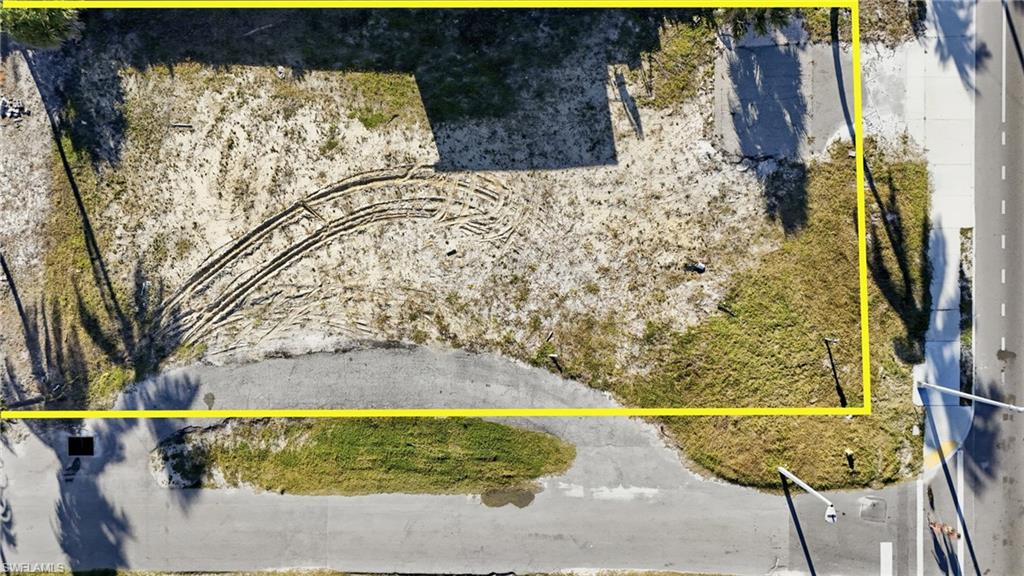 Aerial view of property's location with property boundaries highlighted - Virtually Edited Image