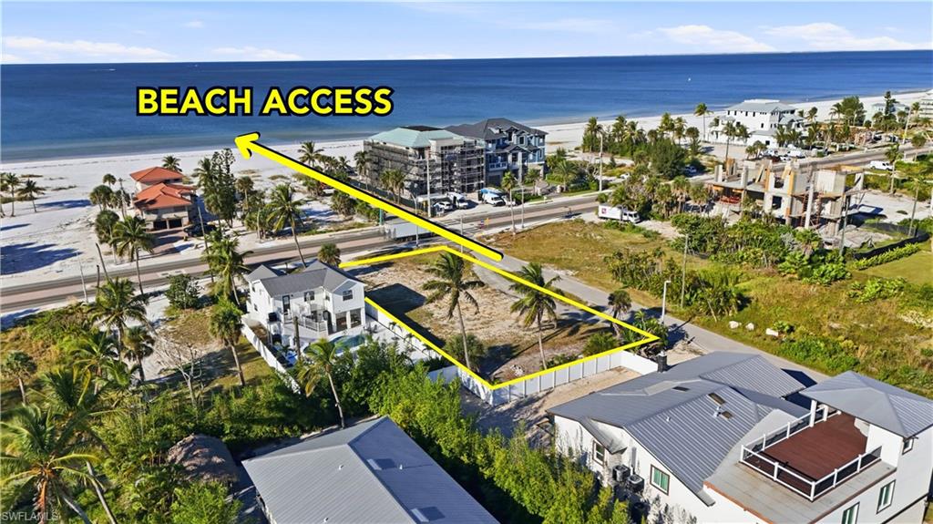 View of property location with expansive beach and property boundaries highlighted - Virtually Edited Image