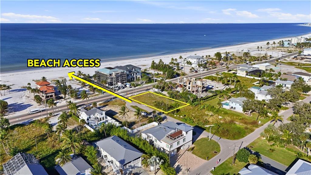 Aerial view of property's location featuring expansive coastline and property boundaries highlighted - Virtually Edited Image
