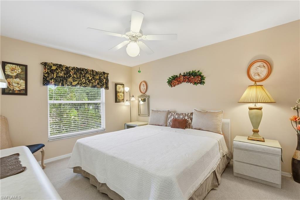 Bedroom with carpet flooring and ceiling fan