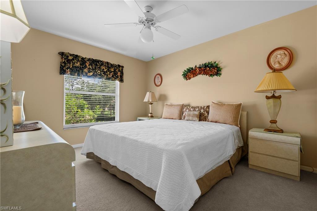Bedroom featuring carpet flooring and a ceiling fan