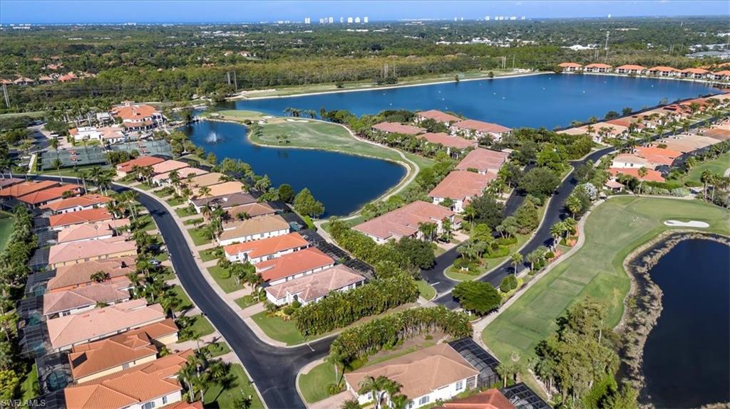 Aerial overview of property's location featuring nearby suburban area and a nearby body of water