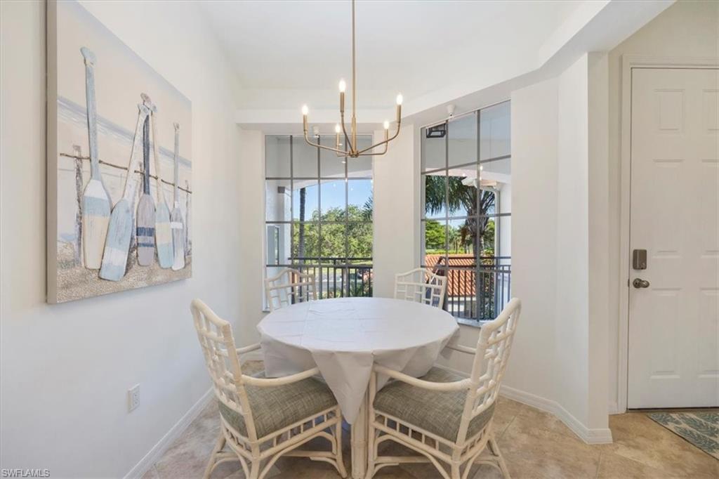 Cafe area featuring a chandelier and round table