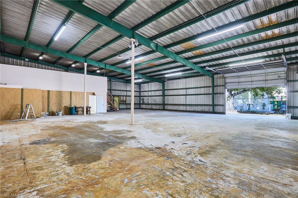 Garage featuring metal wall