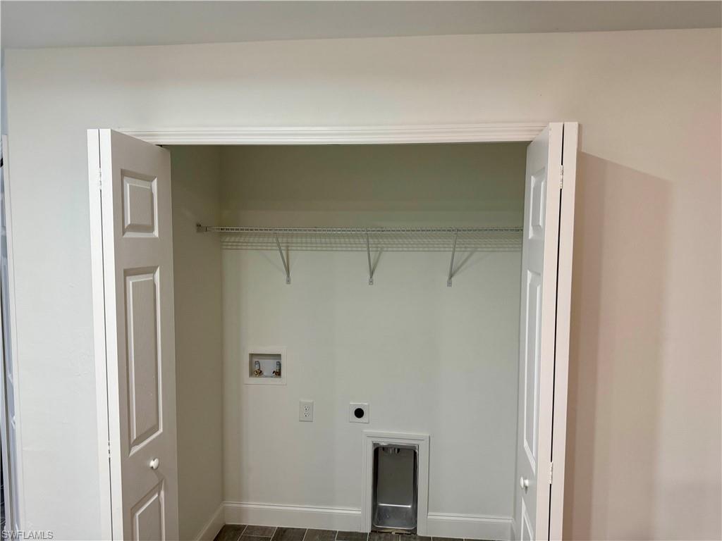 Laundry area with washer hookup and hookup for an electric dryer