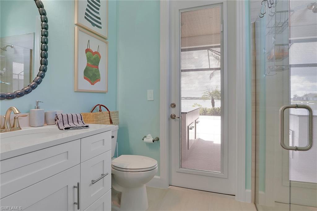 Bedroom featuring baseboards and light tile patterned floors