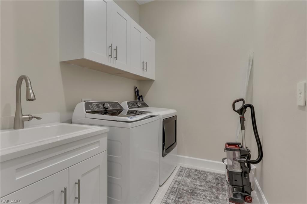 Full bathroom with a shower with shower door and vanity