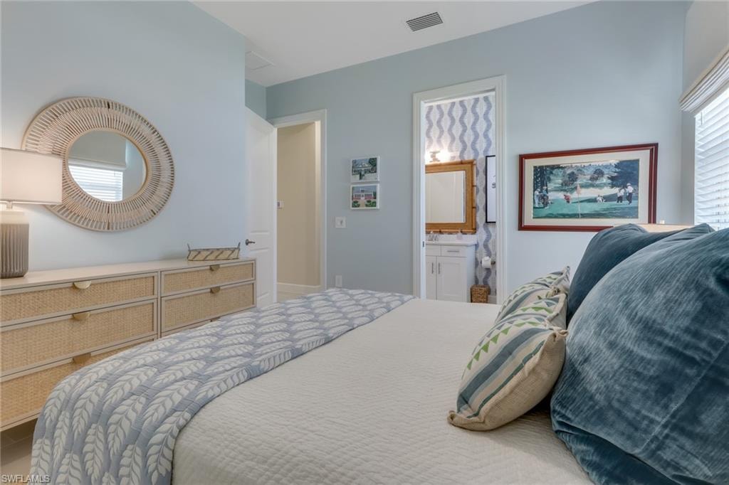 Bedroom featuring ensuite bath