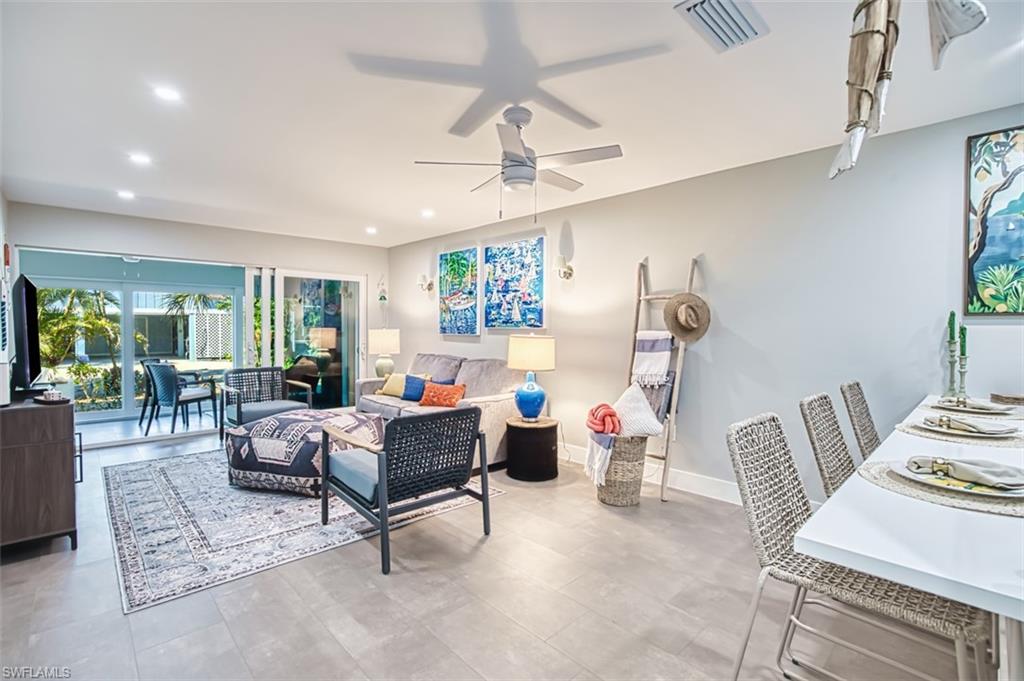 Livin room featuring recessed lighting, ceiling fan and fully furnished