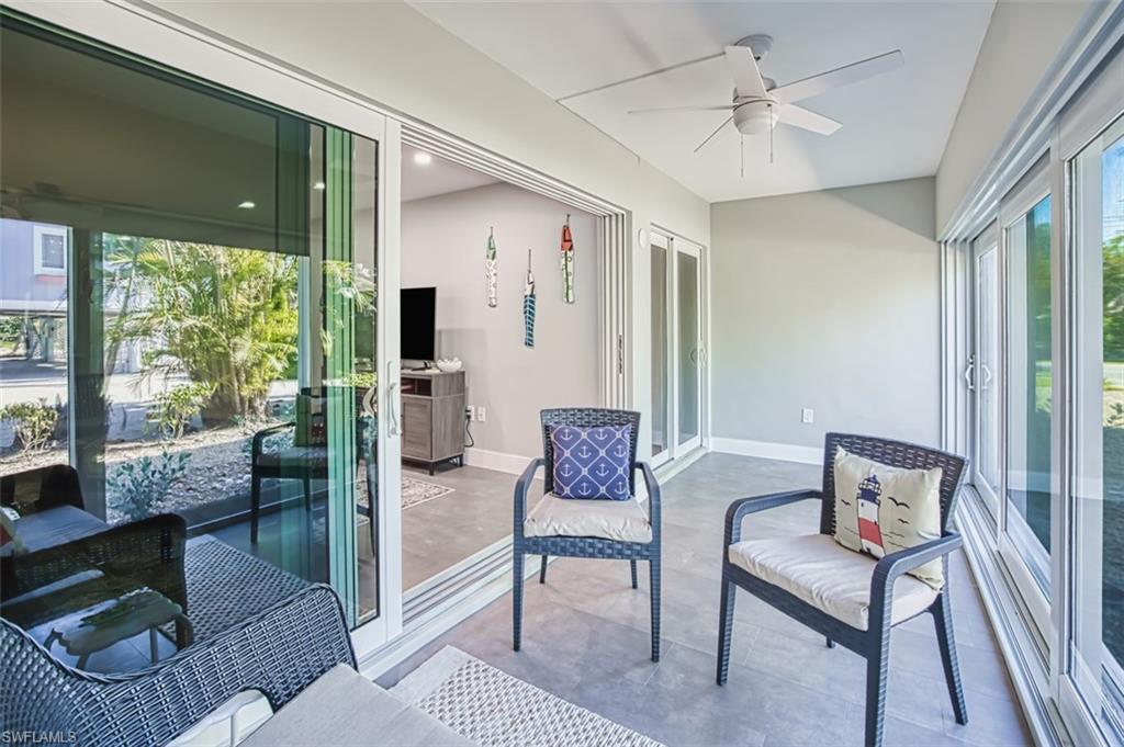 Glass enclosed lanai adding extra living space