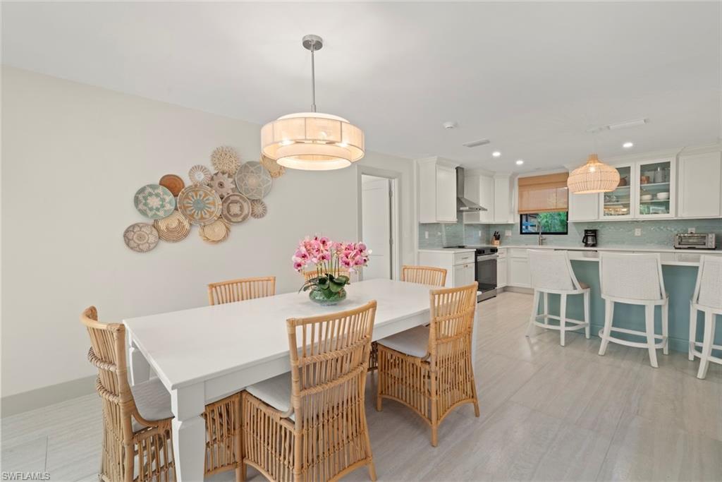 Dining room featuring recessed lighting