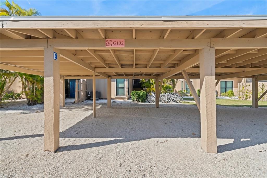 View of home's community featuring covered parking