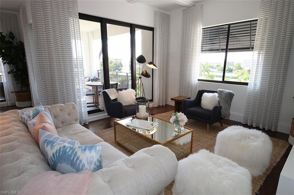 Living room with wood finished floors and baseboards
