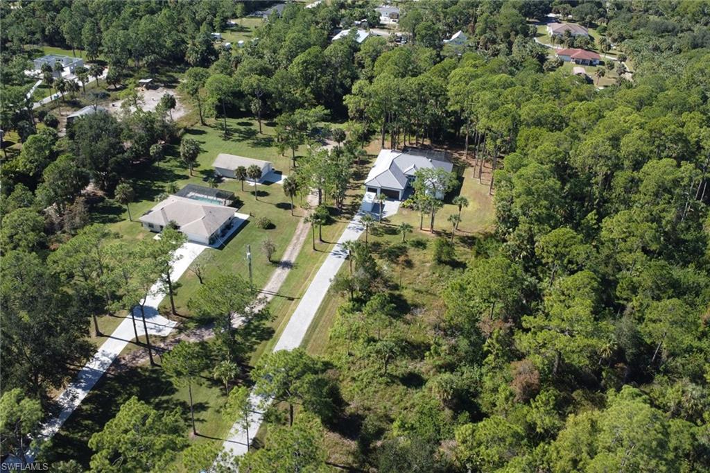 Aerial overview of property's location with a forest