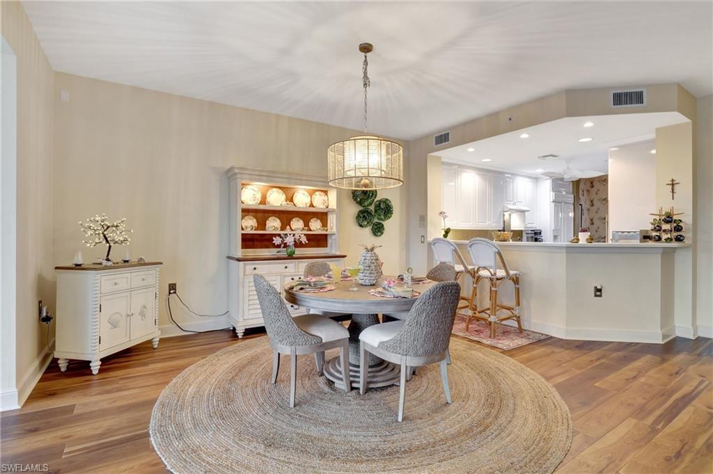 Dining area featuring recessed lighting and light wood-style flooring