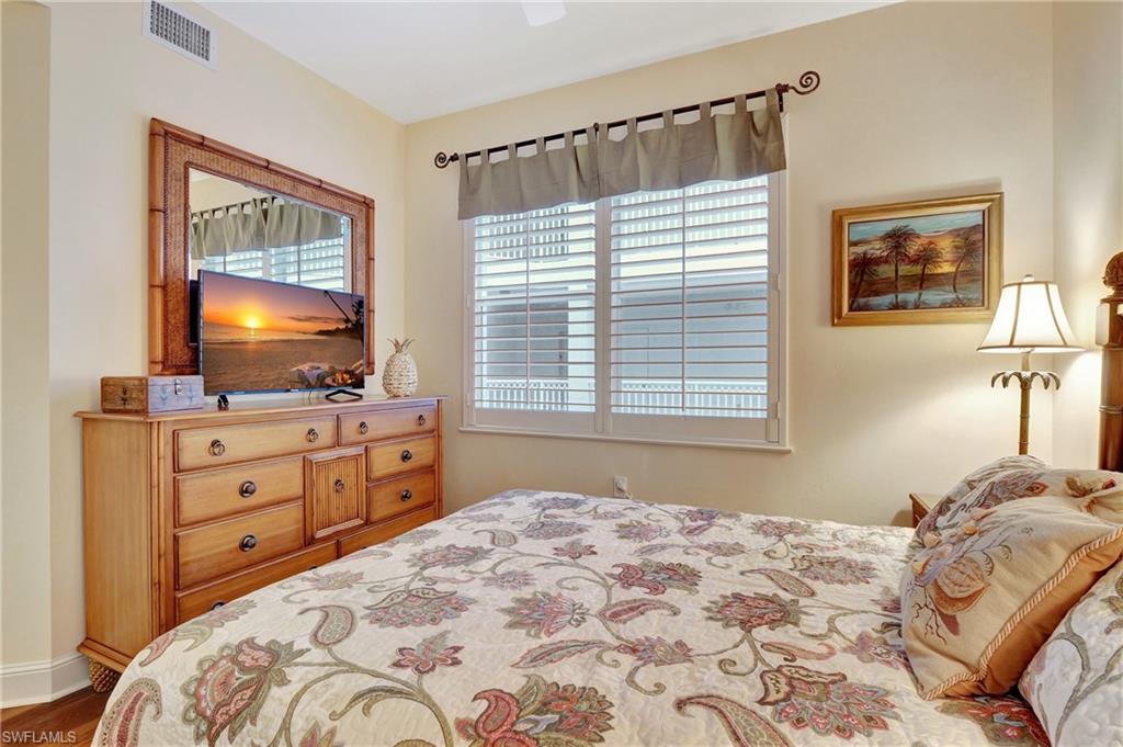 Bedroom featuring ceiling fan and wood finished floors