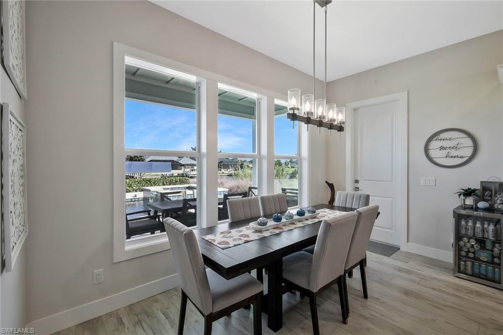 Dining Area with custom lighting.