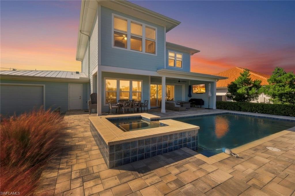 Enjoy breathtaking sunsets while relaxing by the pool or entertaining on the spacious lanai.
