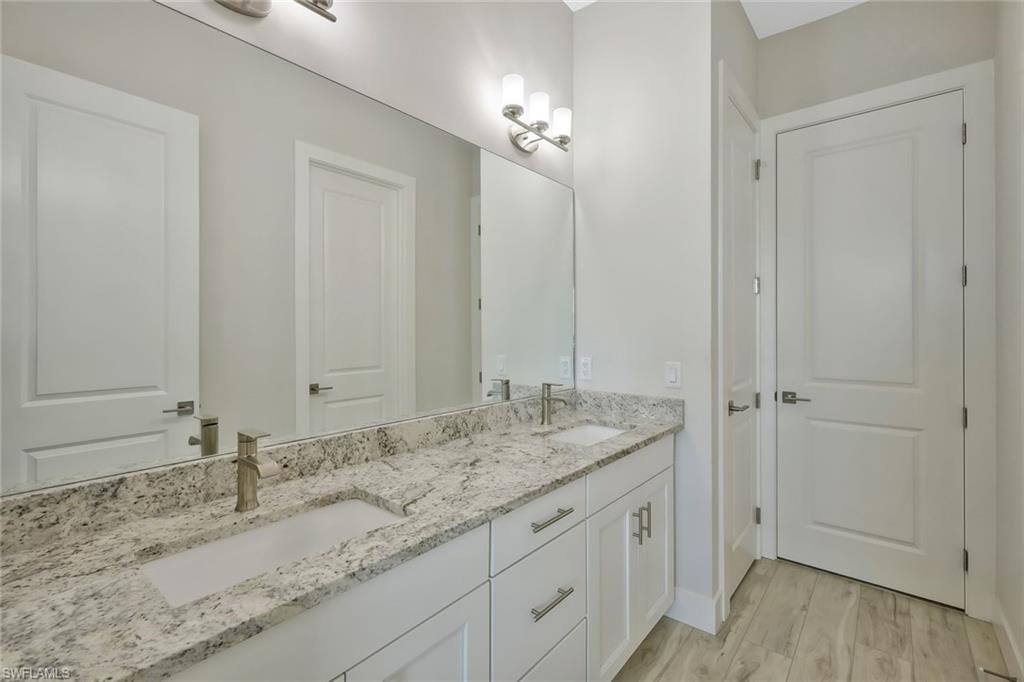 Jack and Jill Bathroom separates two guest bedrooms.