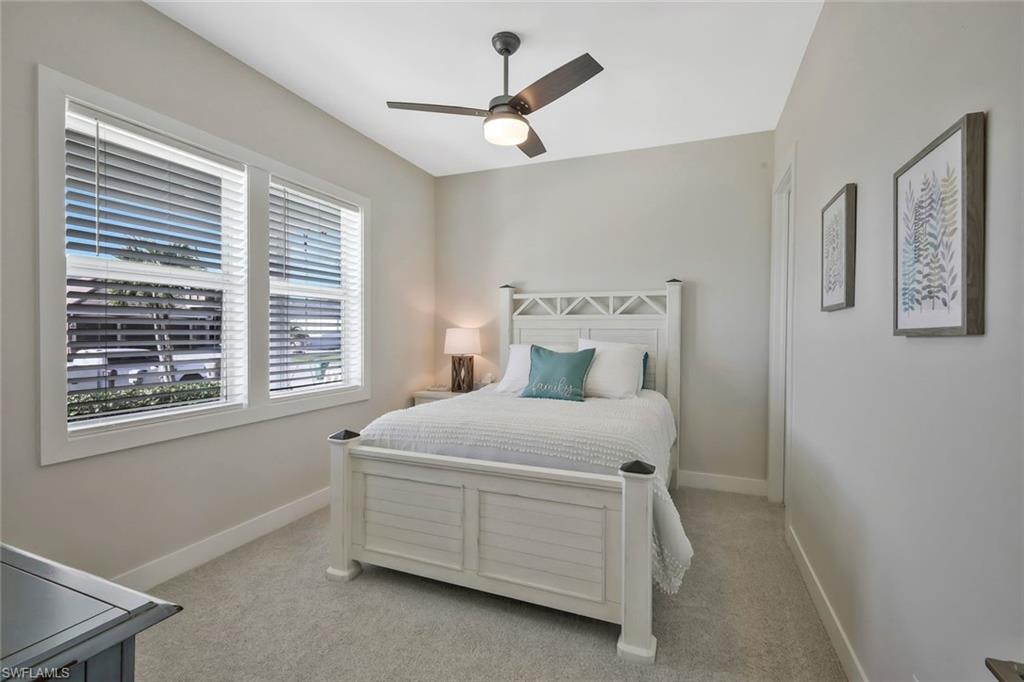 Downstairs guest bedroom with walk-in closet.