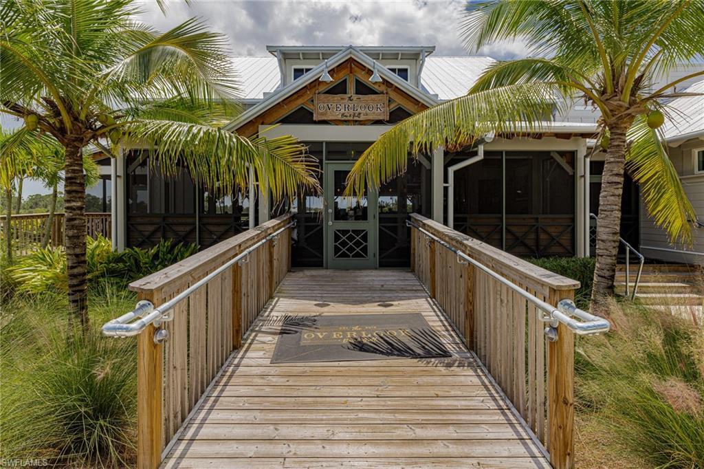 Wooden deck featuring a sunroom