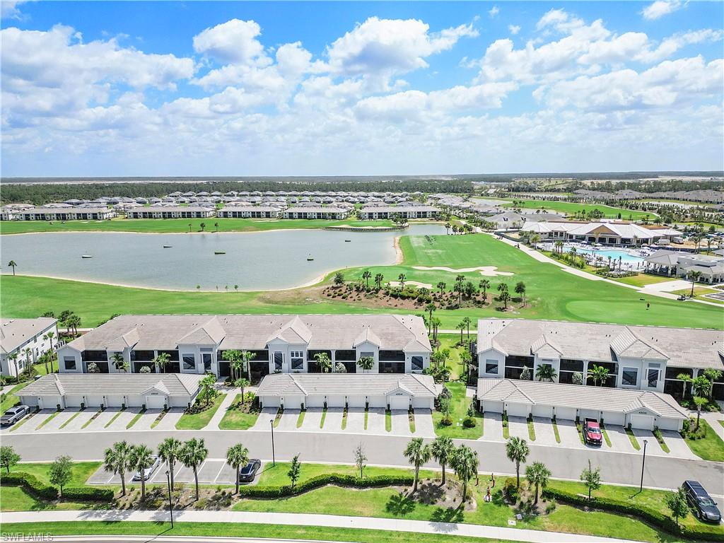 Aerial view of a local golf course and a large body of water