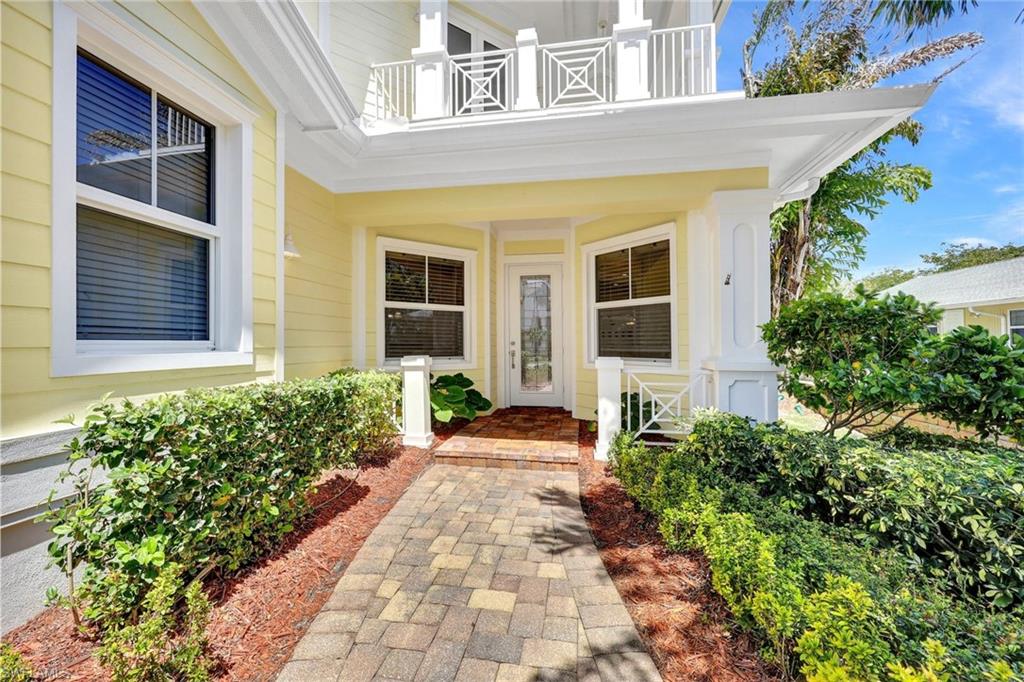 Front entrance to the house with guest-room balcony above