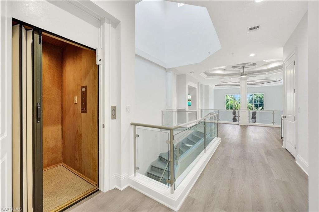 corridor to front guest-suite and elevator