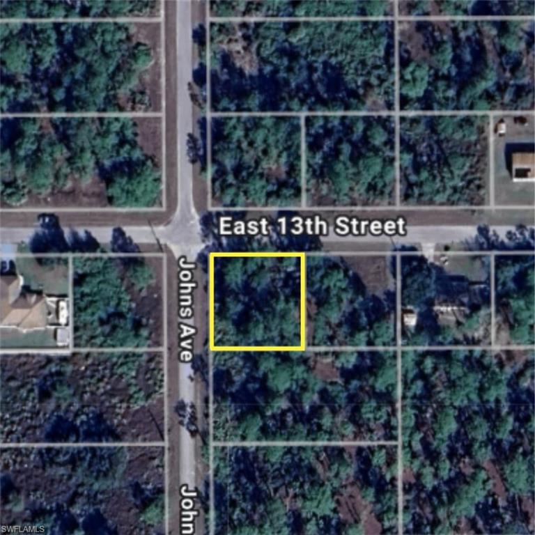 Aerial overview of property's location featuring property boundaries highlighted