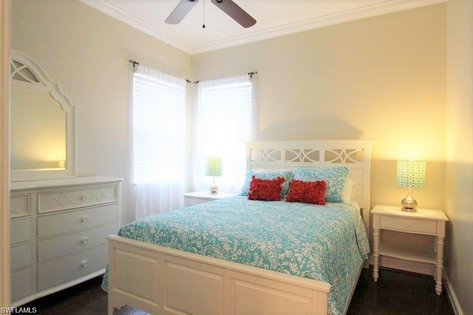 Bedroom featuring crown molding and ceiling fan